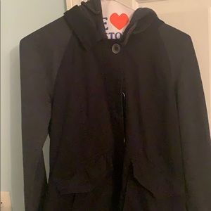 black jean jacket with sweater sleeves